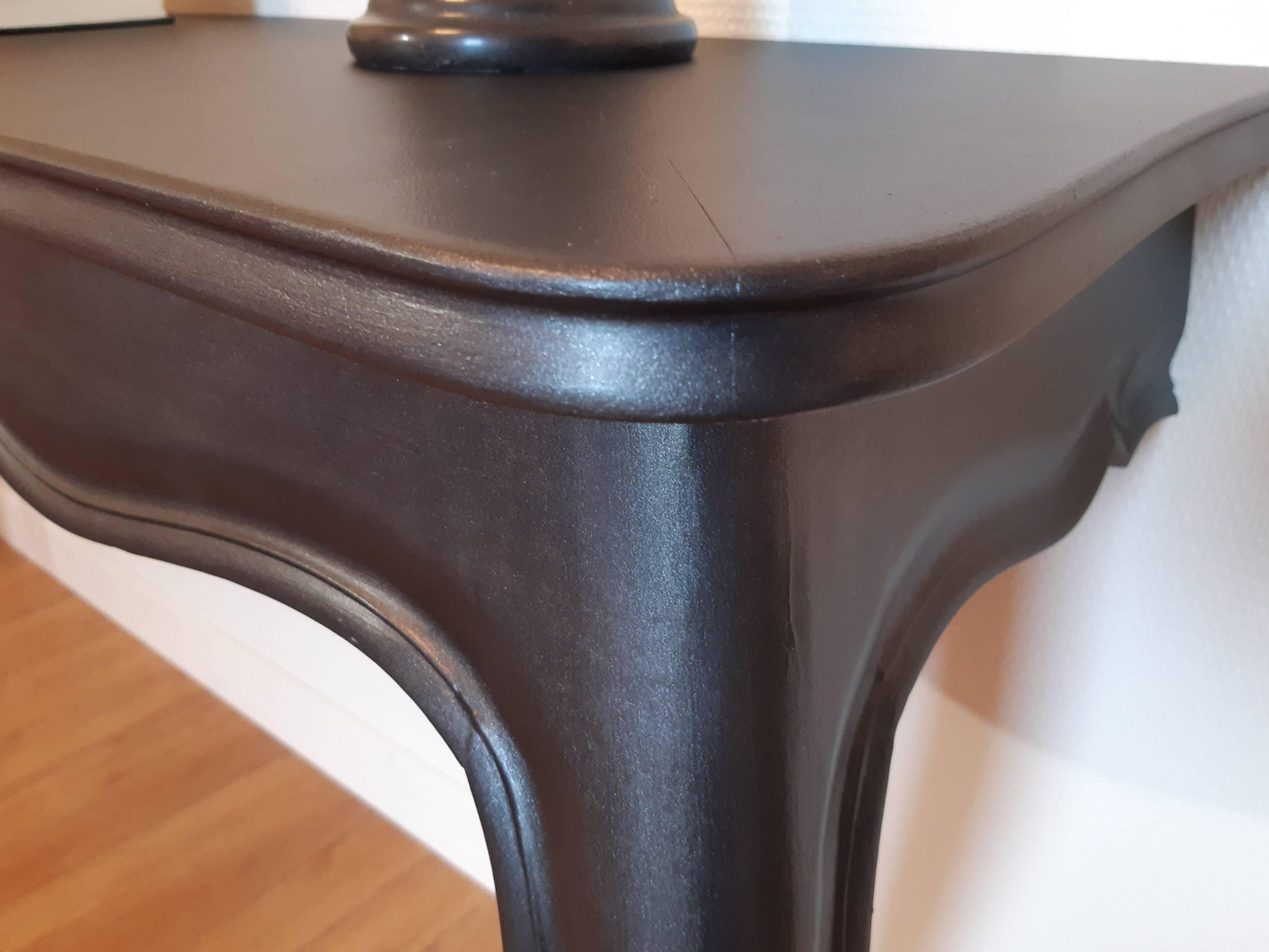 Louis XV-style black wall console