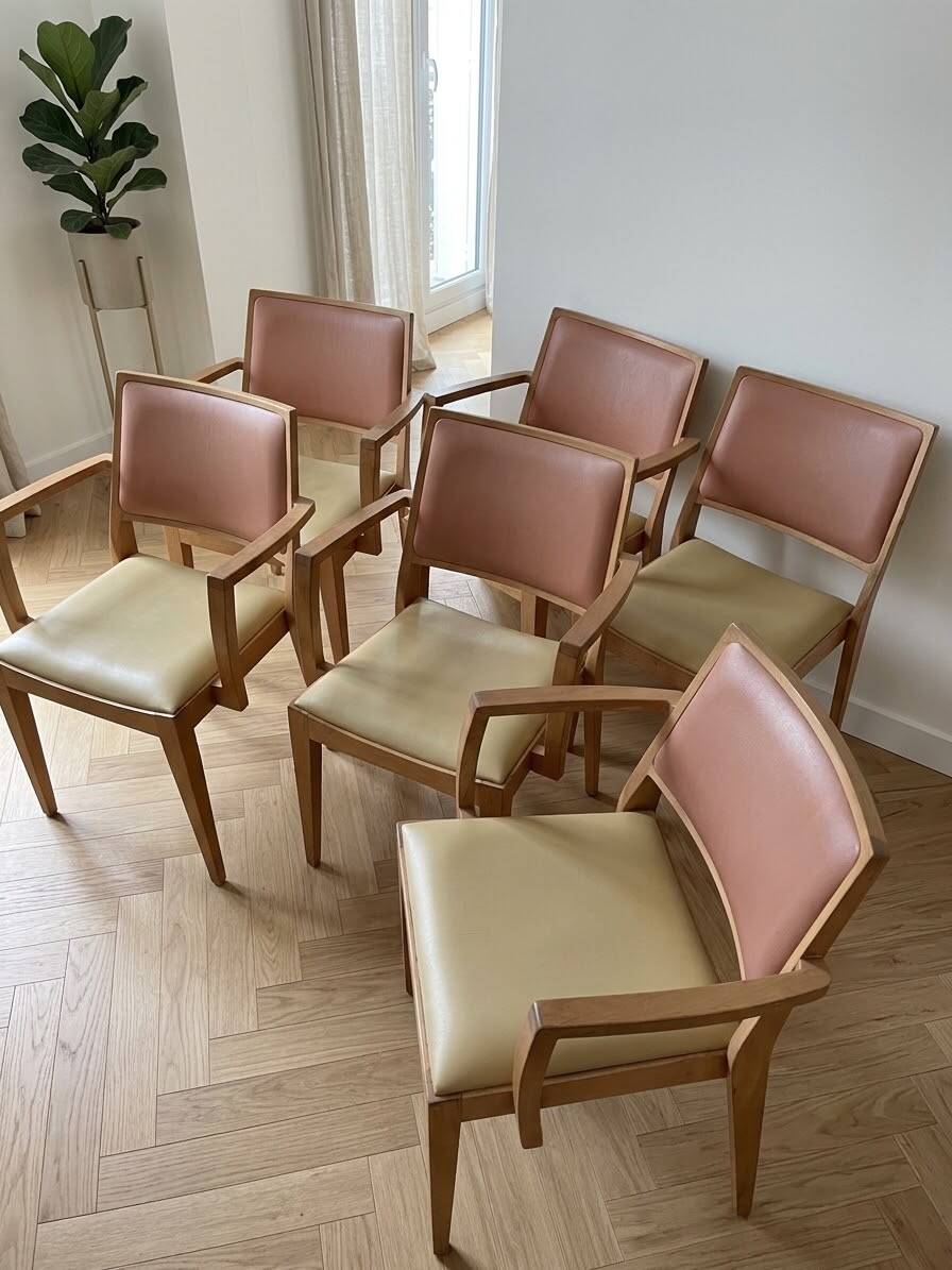 Set of 6 vintage Scandinavian chairs in wood and faux leather.