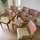 Set of 6 vintage Scandinavian chairs in wood and faux leather.