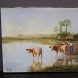 Oil on canvas depicting cows at the edge of the pond circa 1900