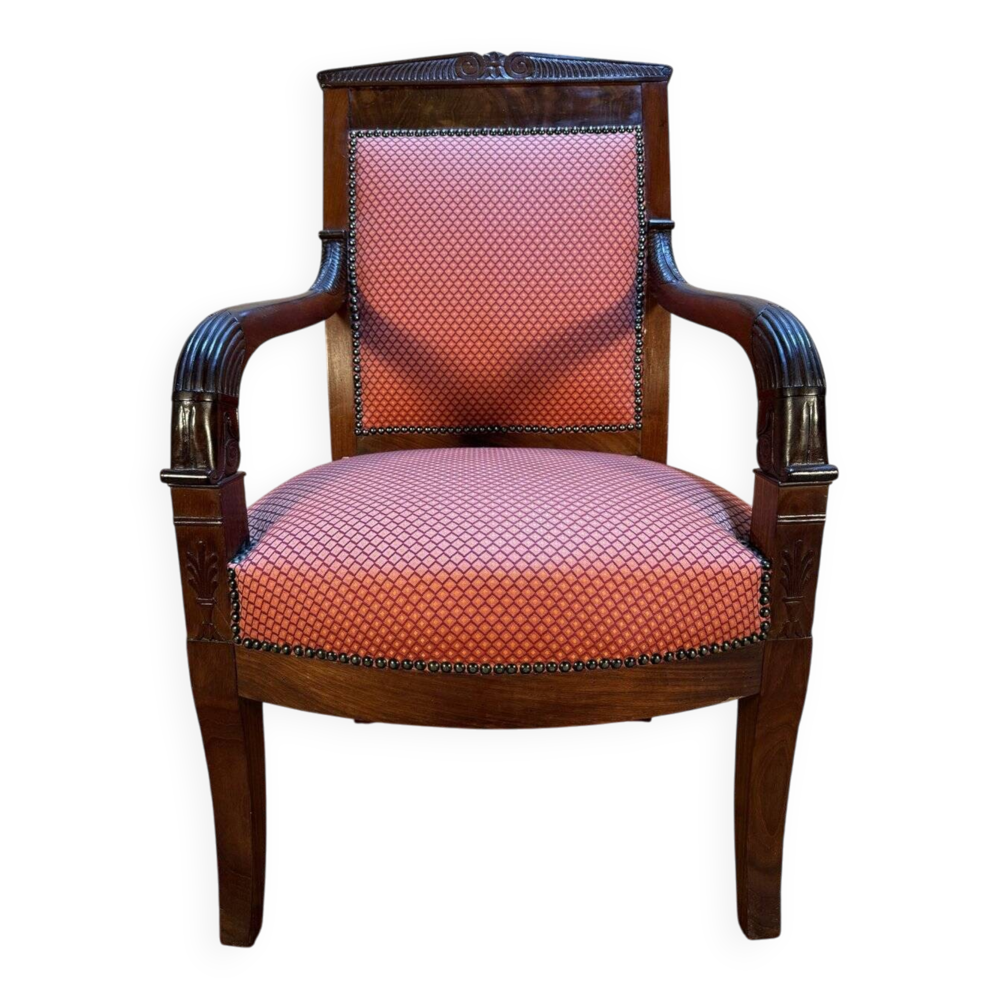 Empire period armchair in mahogany with saber legs.
