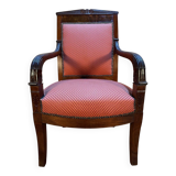 Empire period armchair in mahogany with saber legs.