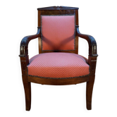 Fauteuil époque Empire en acajou pieds sabres
