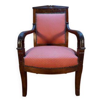 Empire period armchair in mahogany with saber legs.