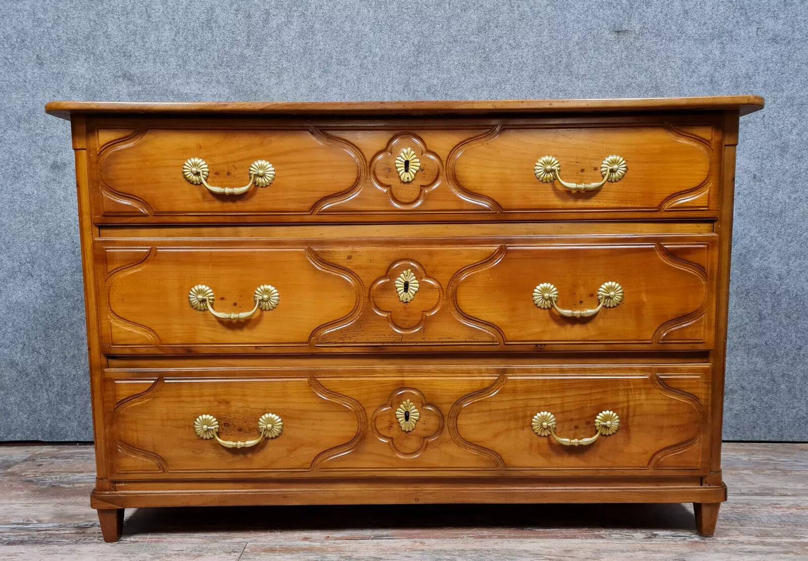 Louis XVI period chest of drawers in solid cherry wood from the second half of the 18th century