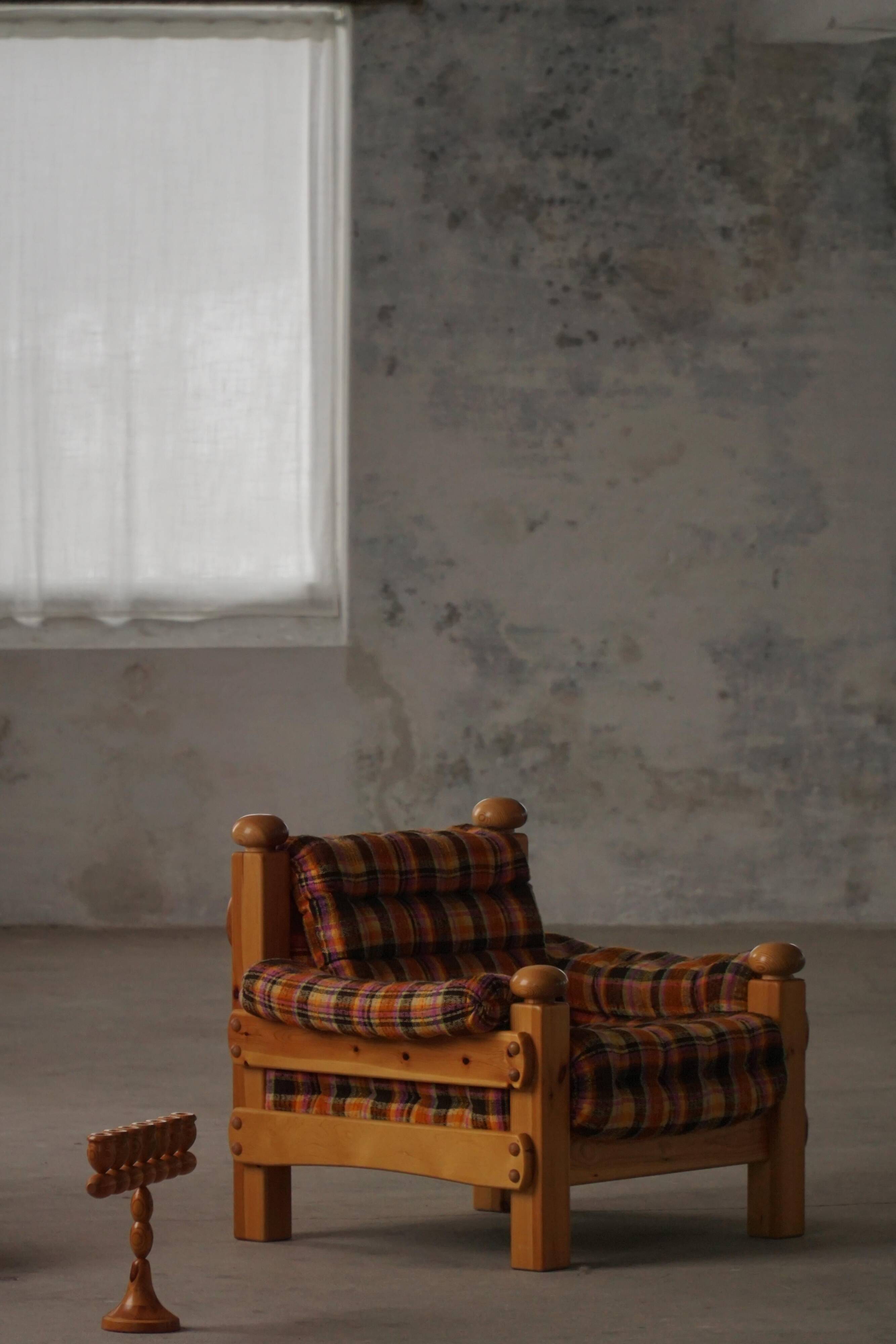 Brutalist lounge chair in solid pine, Swedish modern, made in the 1970s.