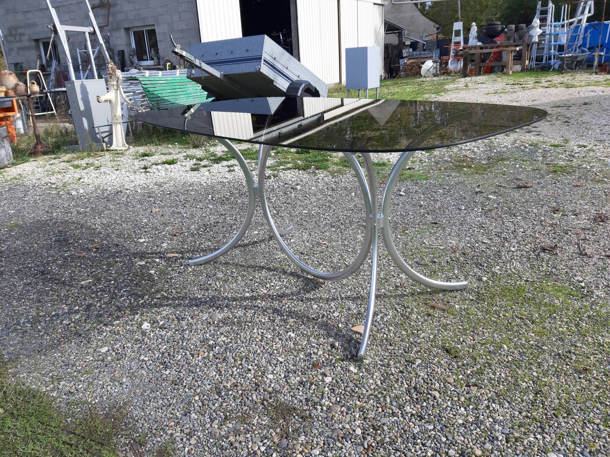 Vintage table of the 70s in chrome and smoked glass
