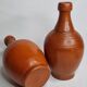 Pair of glazed terracotta jars, 26 cm