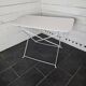Old folding wrought iron garden table