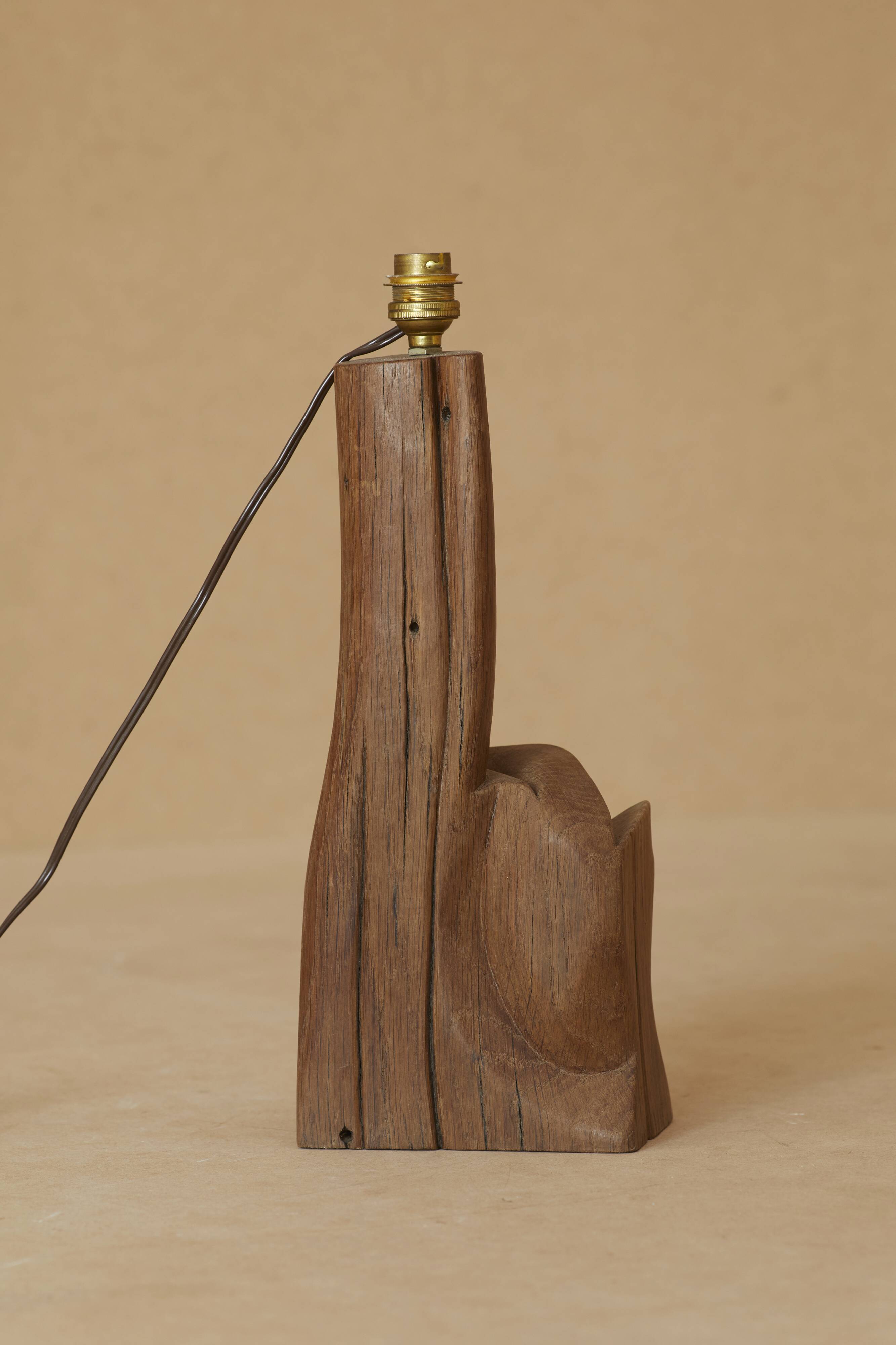Sculptural lamp in solid wood circa 1960