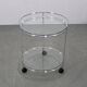 Mid-century round serving table, chrome and glass, Italy, 1980s