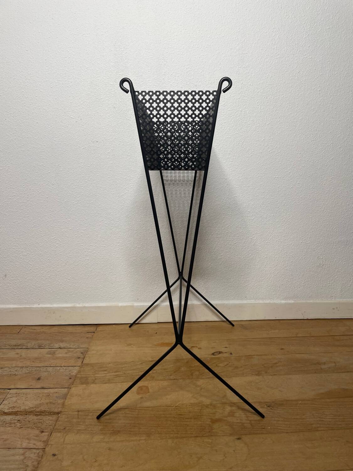 1950s black perforated metal planter in the style of Mathieu MATEGOT