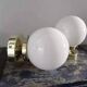 Paire d’appliques globes en opaline blanche