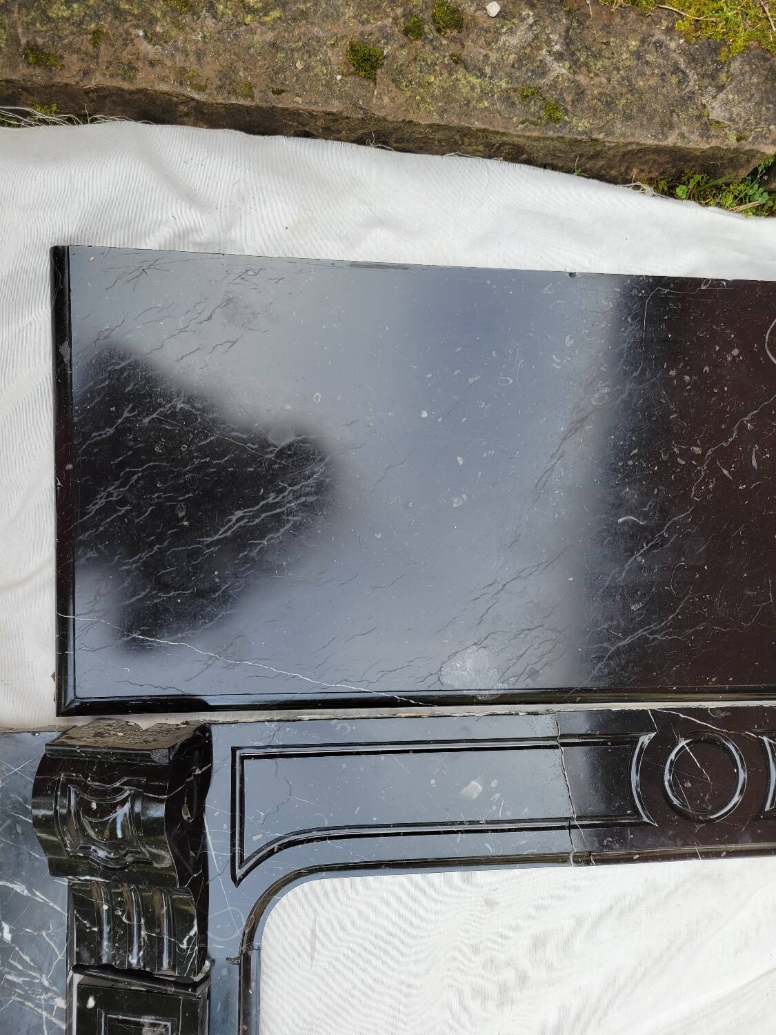 Pompadour fireplace with black marble modillions