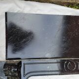 Pompadour fireplace with black marble modillions