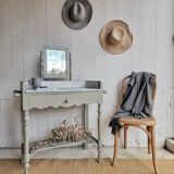 Antique wooden dressing table with marble top and mirror.