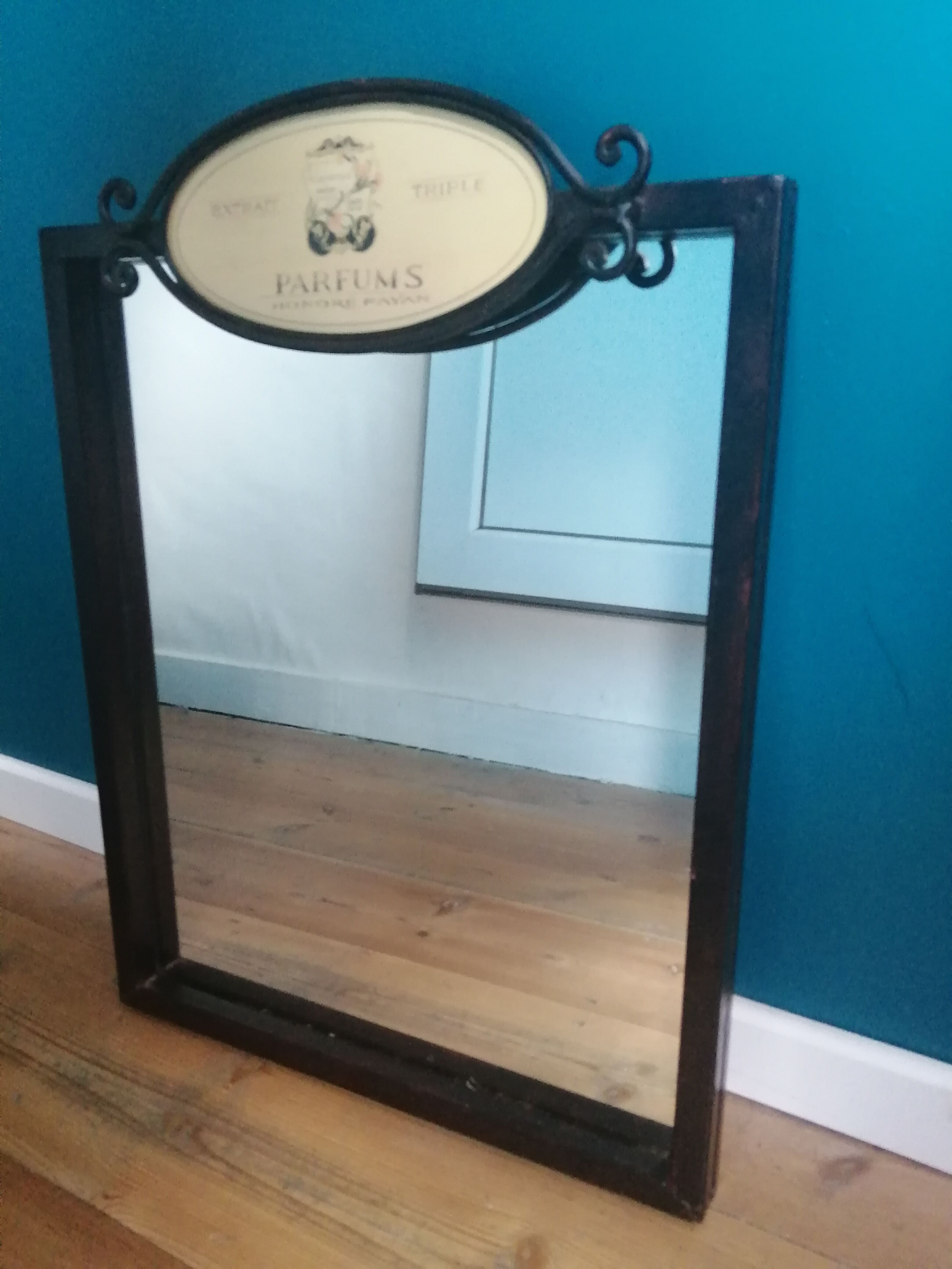 Mirror metal sign perfume