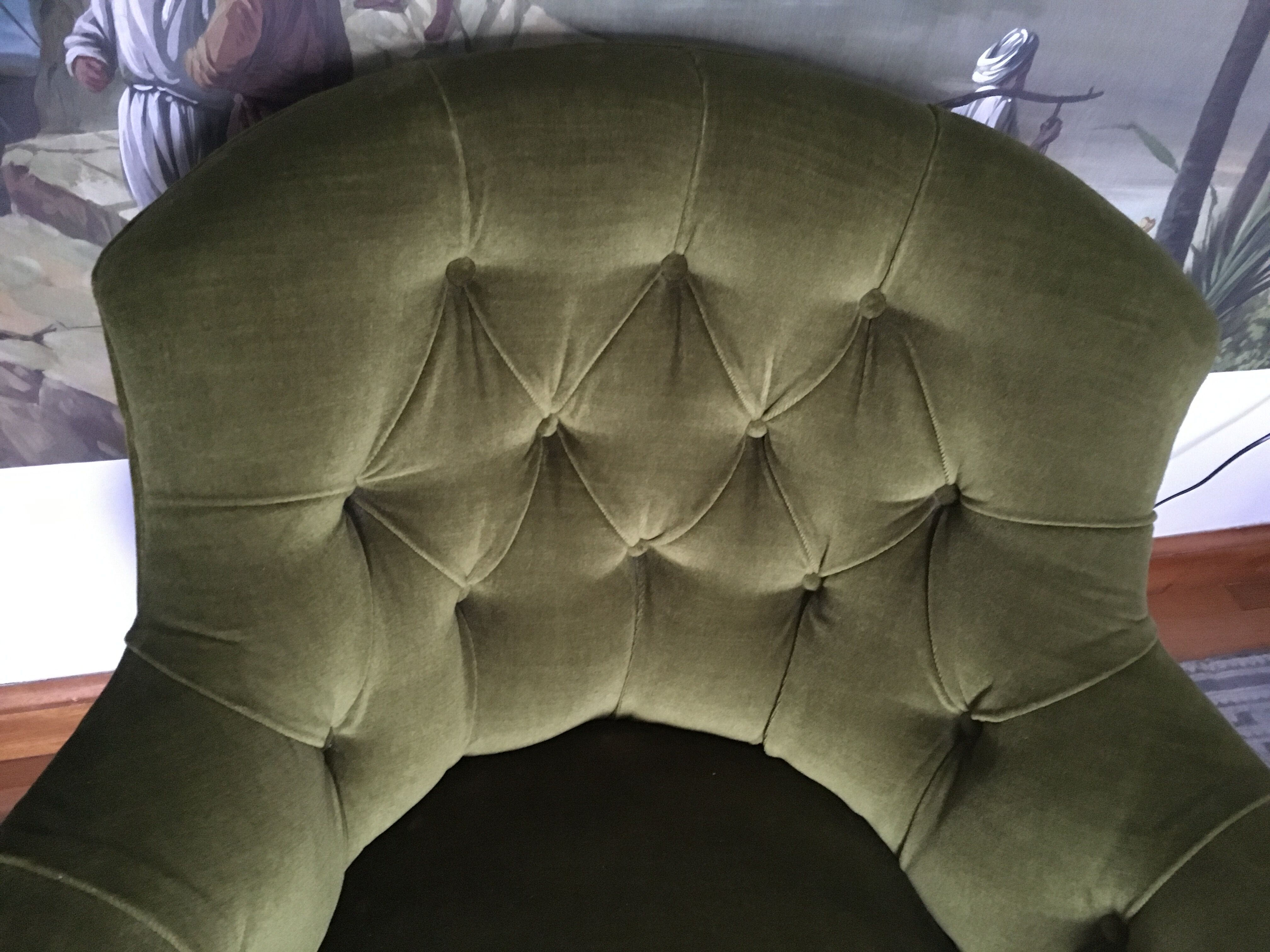 Old chair padded green velvet