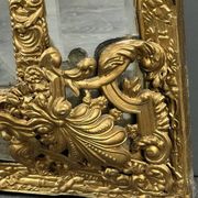 Large antique gilded metal mirror, 19th century