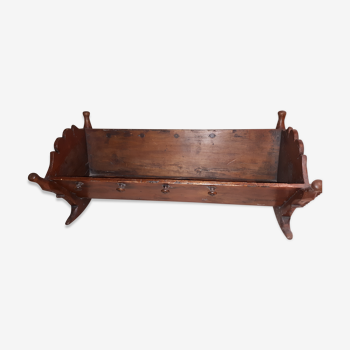Old wooden rocking cradle