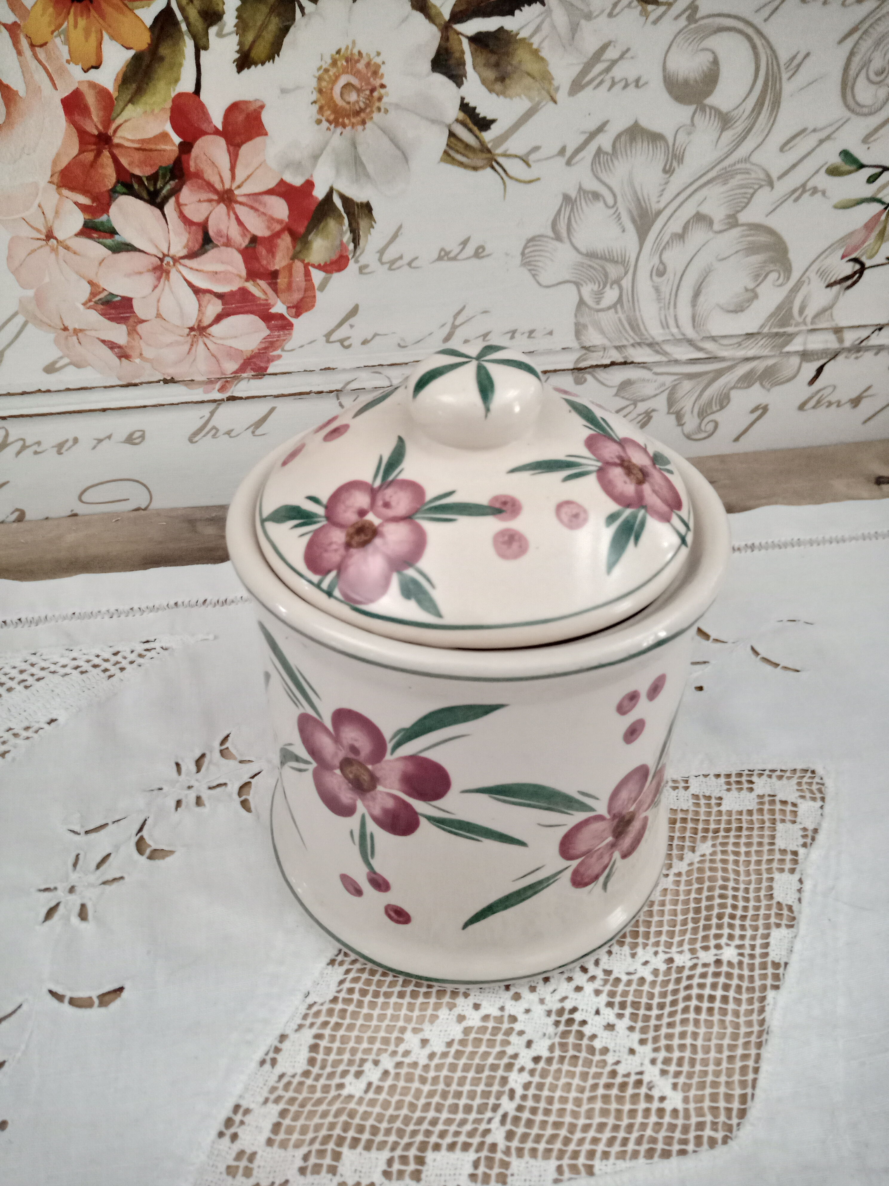 Vintage beige ceramic lid jar decorating pink flowers