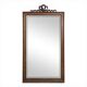 Louis XVI style mirror in carved walnut.