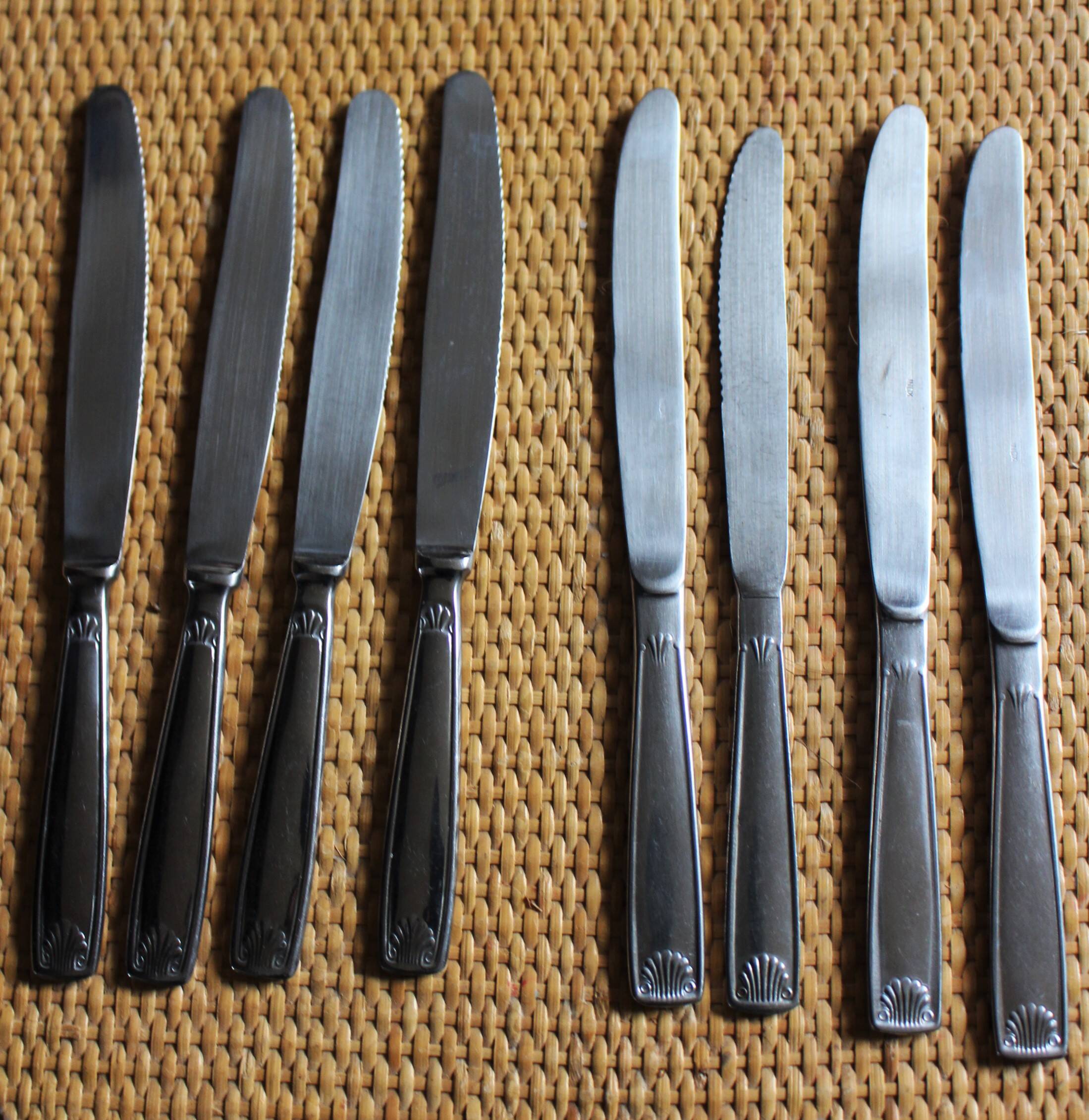 Mismatched set of 8 forks + 8 vintage shell stainless steel knives