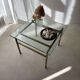 Swedish brass coffee table with a marbled glass top from the 1960s.