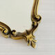 Small antique mirror in baroque style – gold frame in bronze or brass.