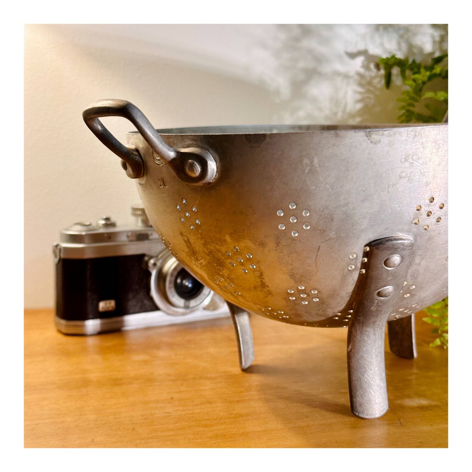 Old aluminum colander