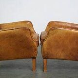 Ensemble de fauteuils en cuir couleur cognac clair de style anglais.