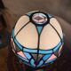 antique wrought iron lamp, 1900 to 1930 with stained glass lampshade soldered with lead