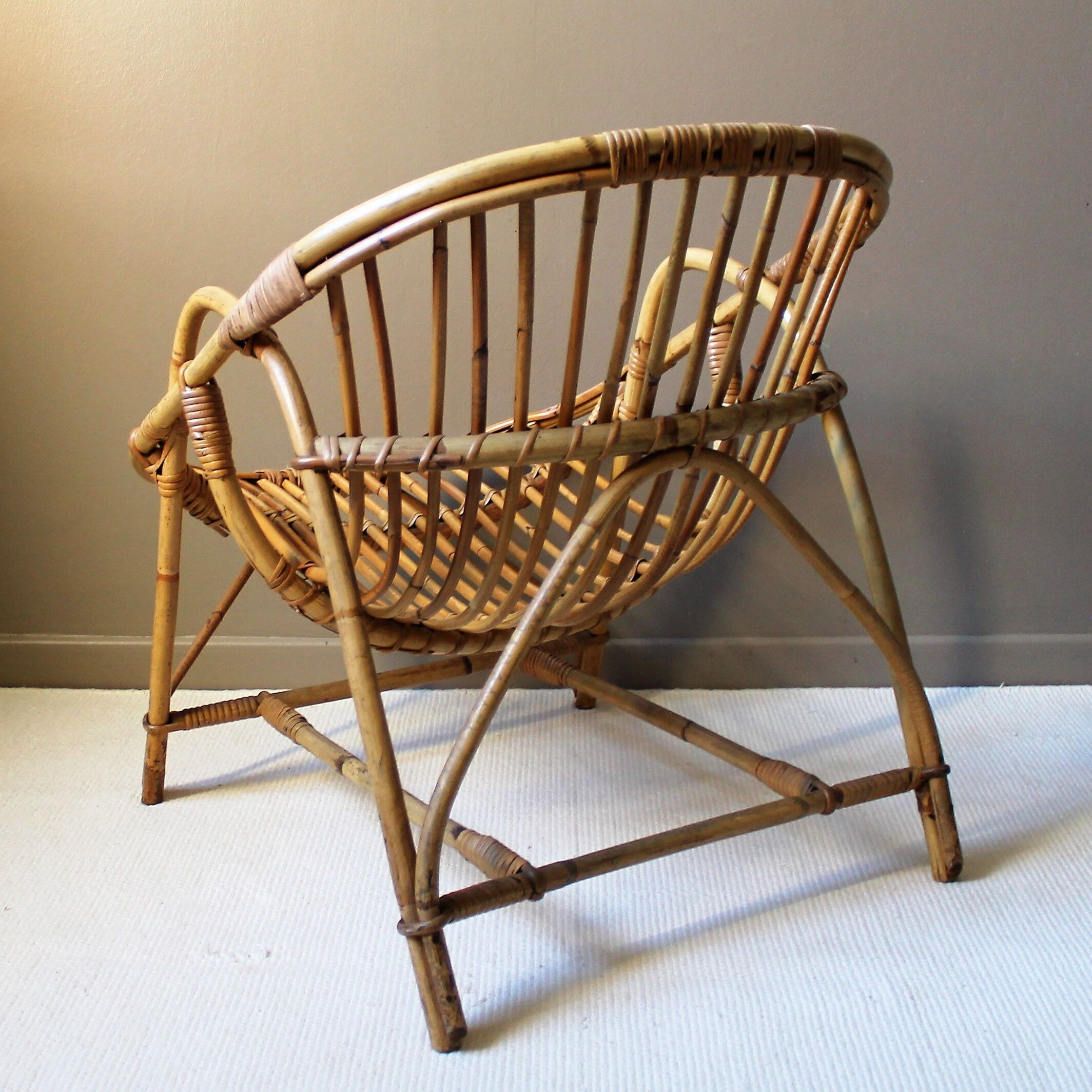 Vintage rattan adult armchair
