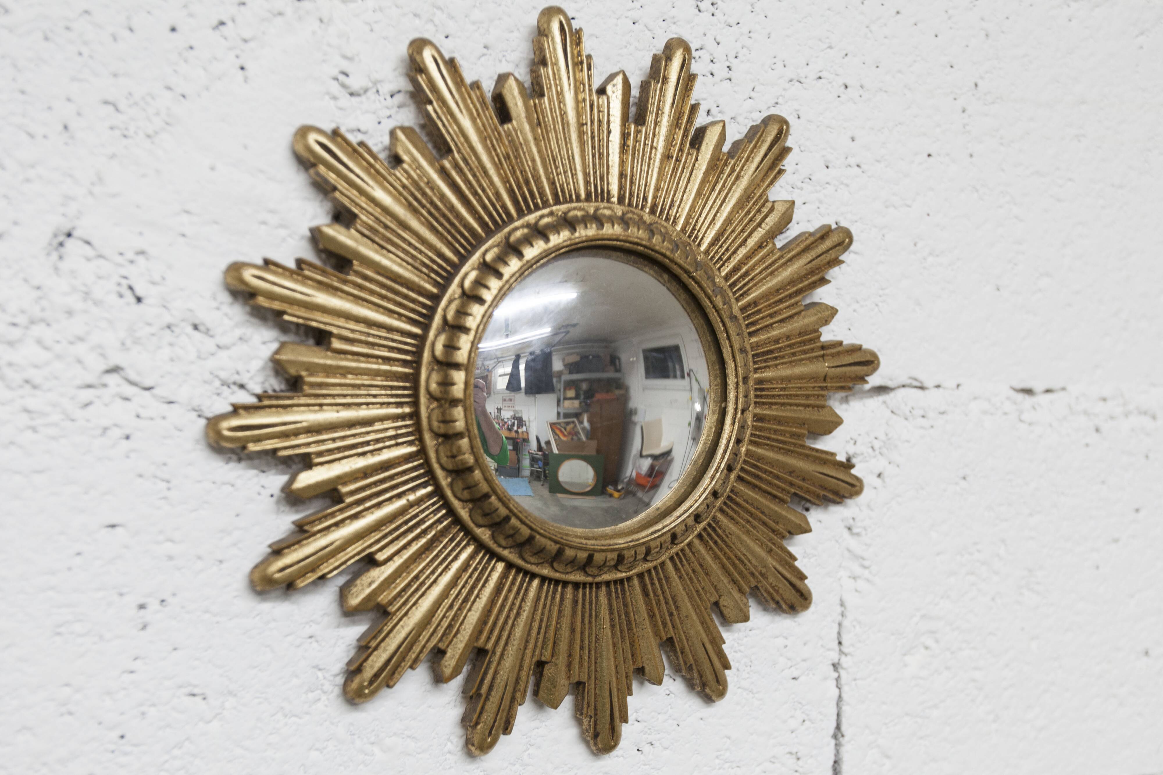 Vintage 1970s convex witch's eye sunburst mirror