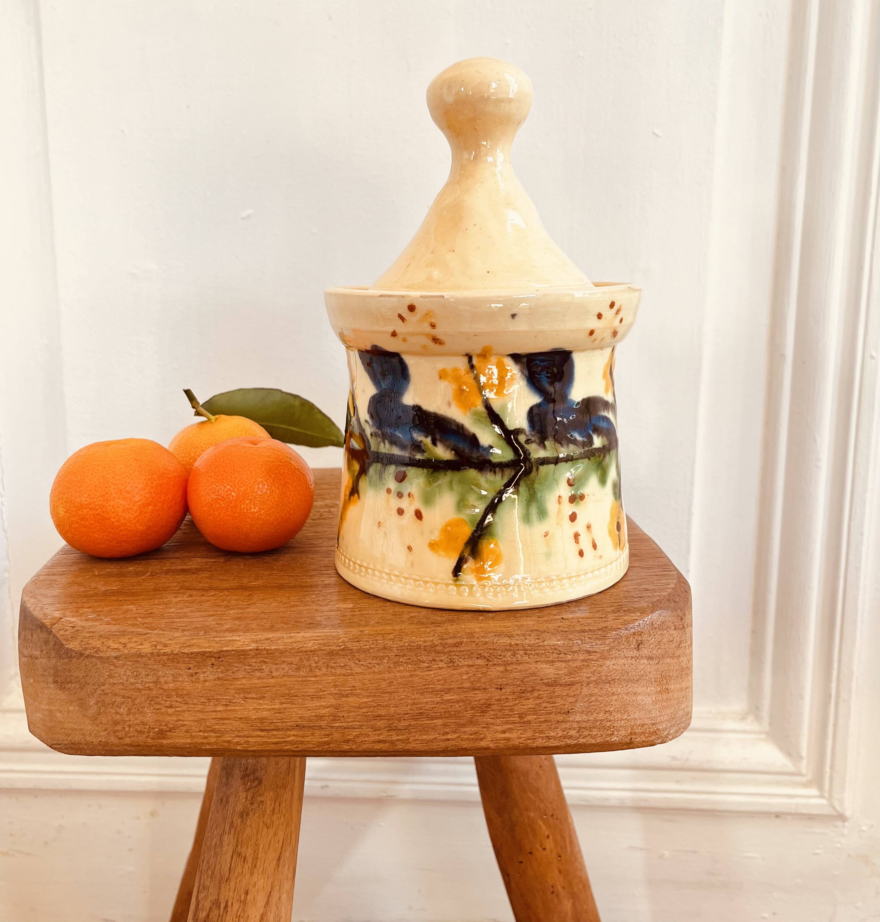 Hand painted ceramic covered pot