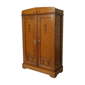 Cabinet in artisanal oak early twentieth century