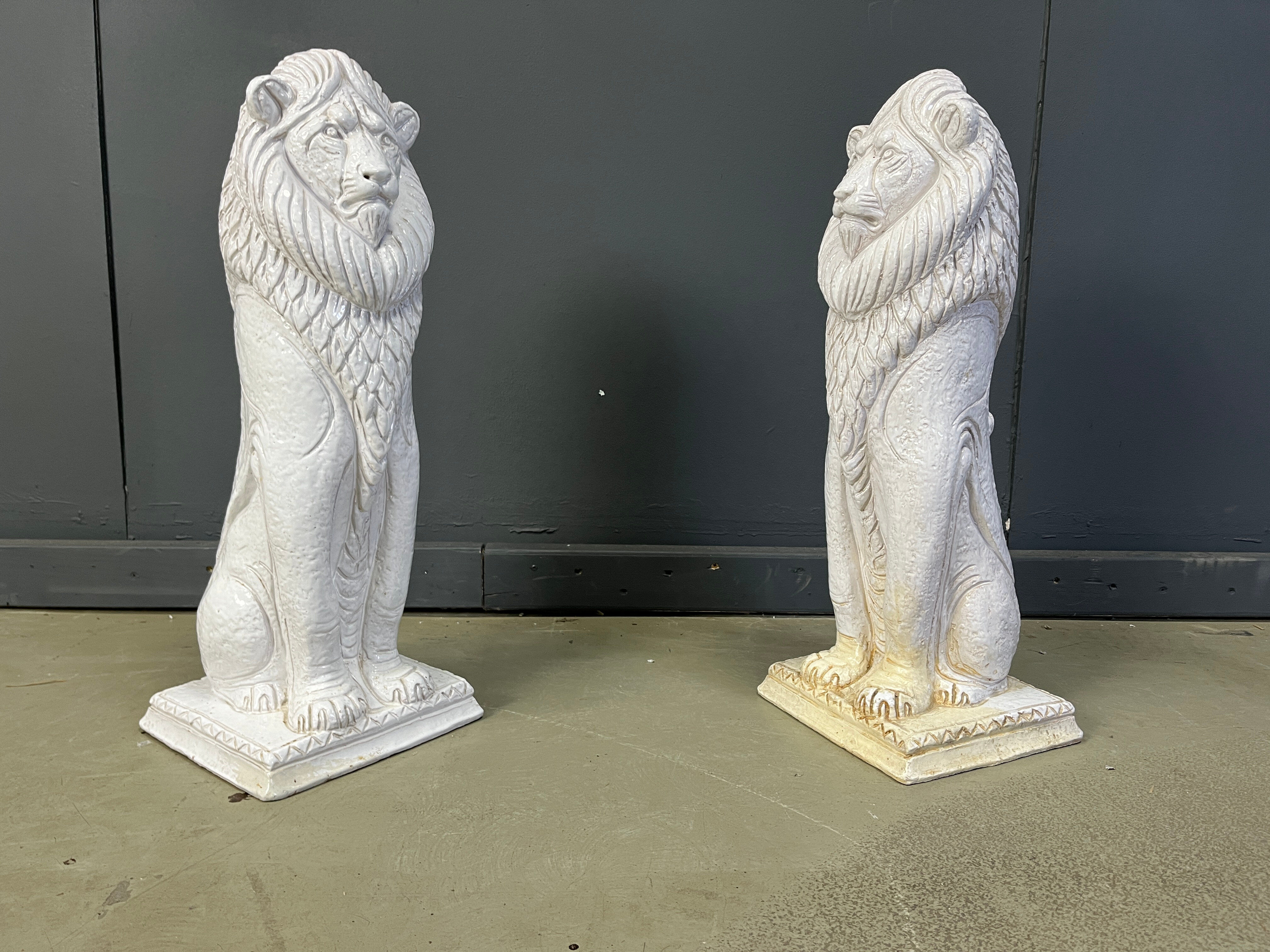 Pair of Renaissance style terracotta lion sculptures, 1950s