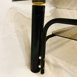 Black and gold coffee table with double tops in smoked glass circa 1970