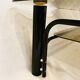 Black and gold coffee table with double tops in smoked glass circa 1970