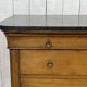 Commode Restauration XIXème en merisier et dessus marbre noir