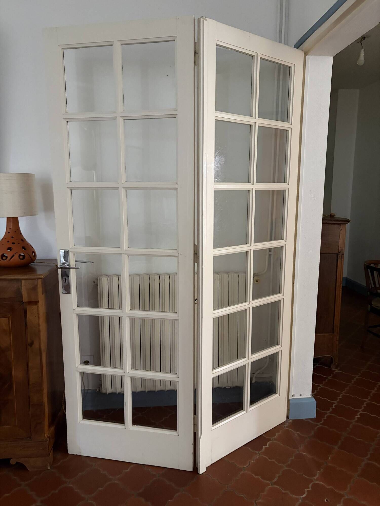 Triptych glass door with three panels featuring small panes. Vintage.