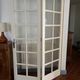Triptych glass door with three panels featuring small panes. Vintage.