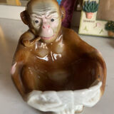 Pipe holder, ashtray or monkey pocket emptier