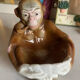 Pipe holder, ashtray or monkey pocket emptier