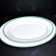 Limoges set of 2 old oval porcelain dishes with green and gold edging