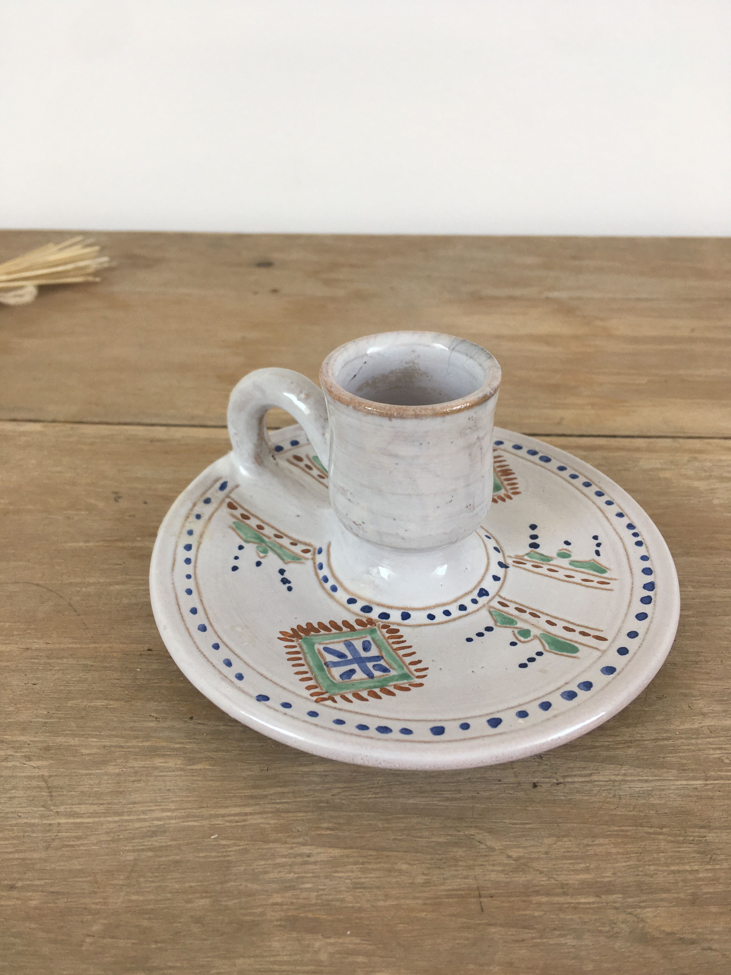 Green ceramic cellar rat candle holder