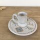 Green ceramic cellar rat candle holder
