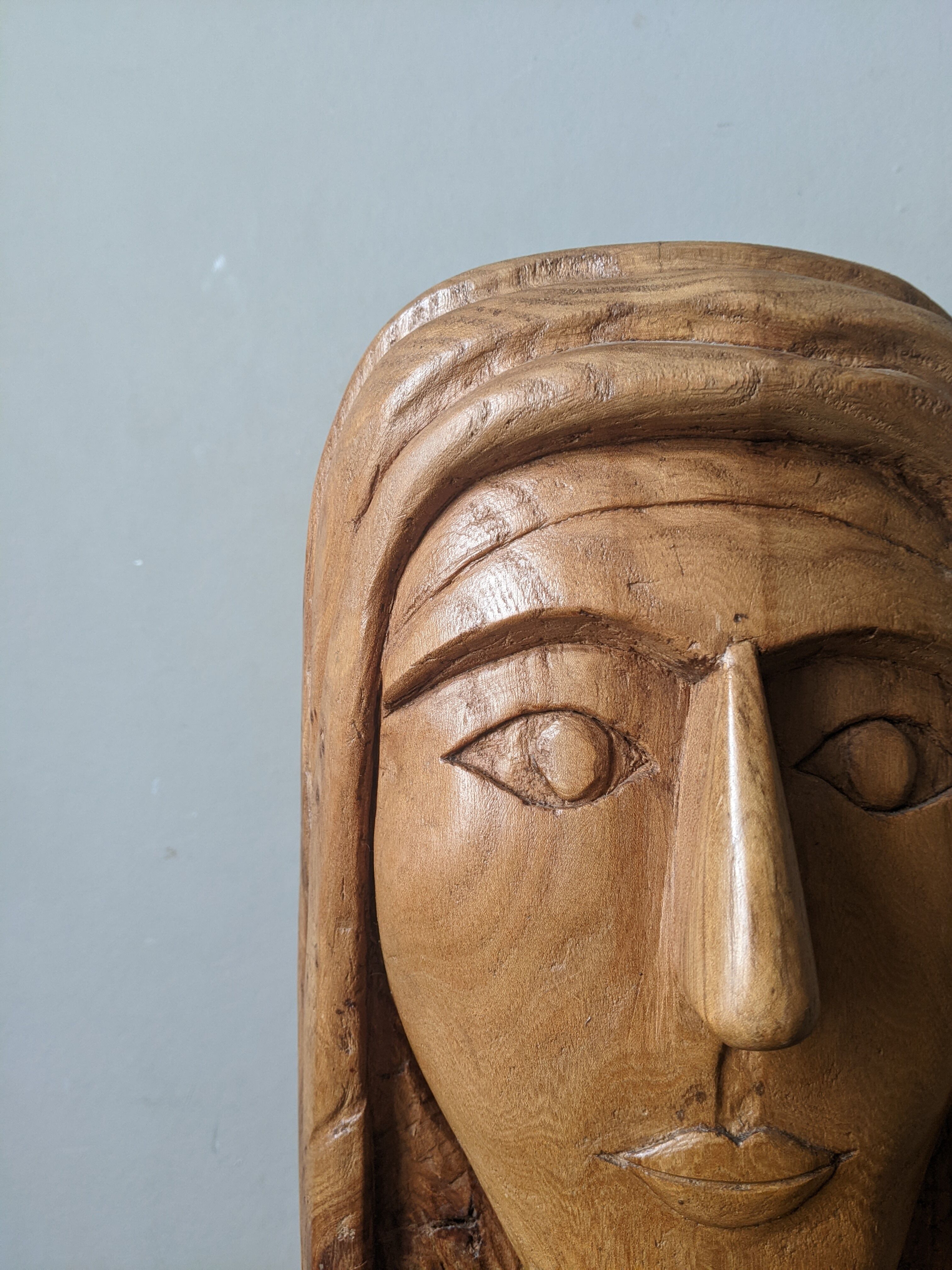 Handcrafted sculpture of the head of Christ in elm.