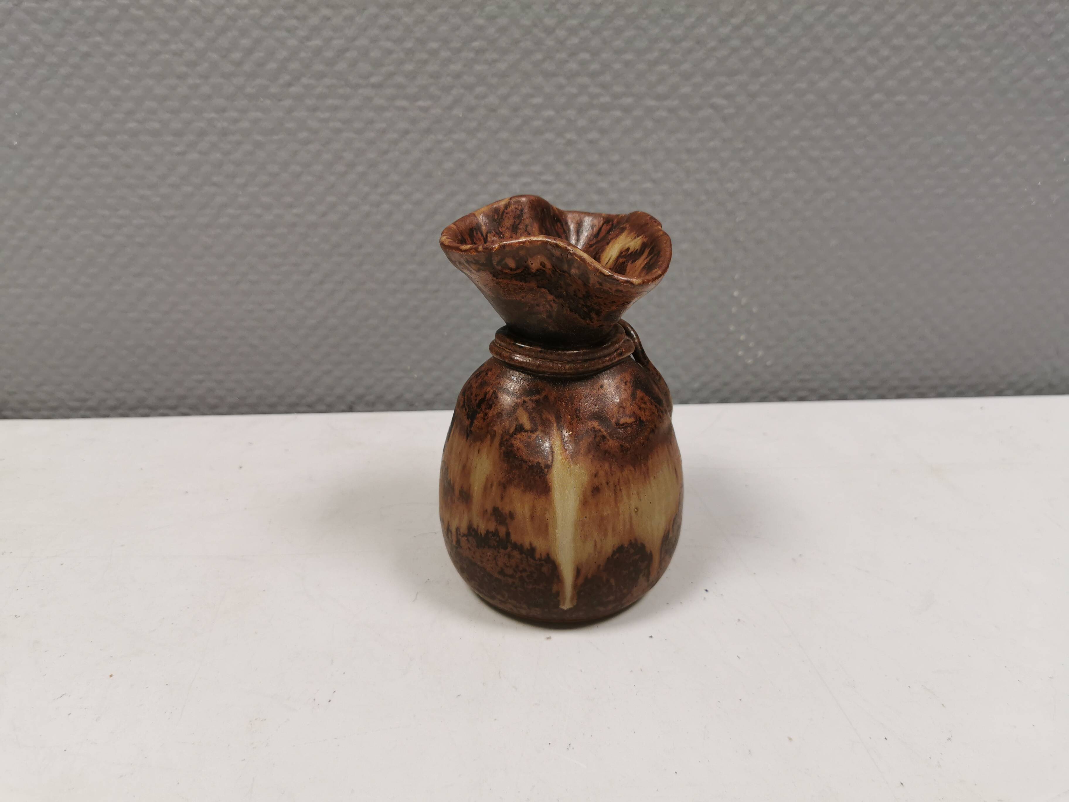 vase shaped like a money bag, in beautiful earthy colours.