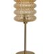 Table lamp with an old vintage golden striped globe and a golden foot